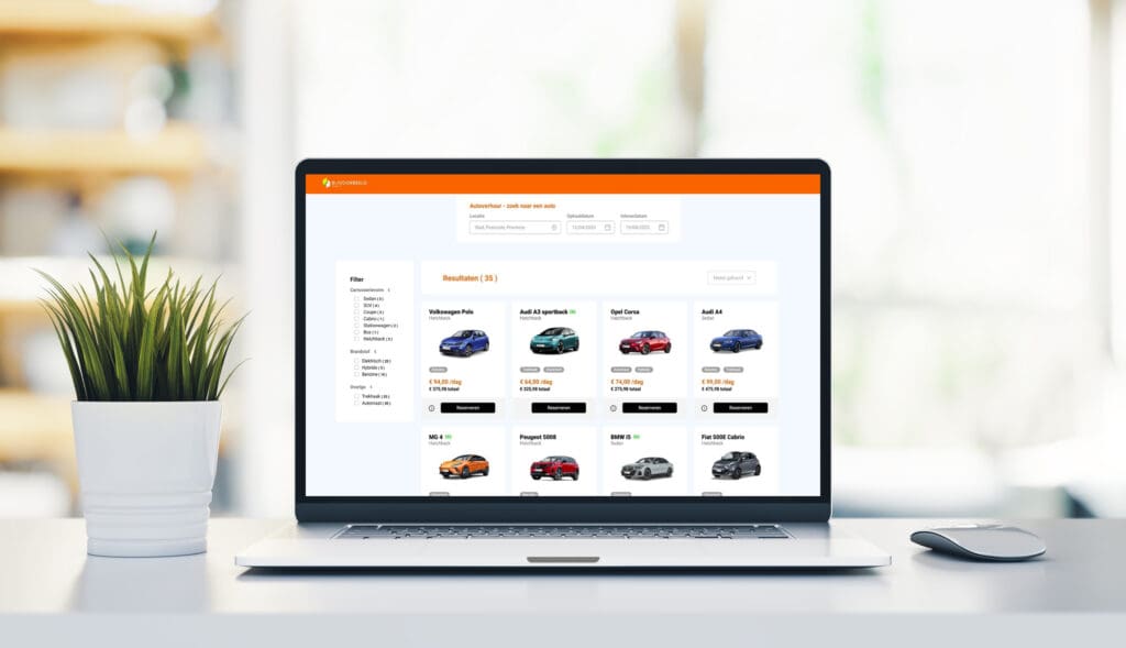 Laptop mit geöffneter AutoDisk Software zur Fahrzeugauswahl und -konfiguration